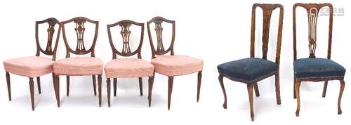 Set of four shield back dining chairs, stuffover upholstered on reeded legs, 21'' wide, 36