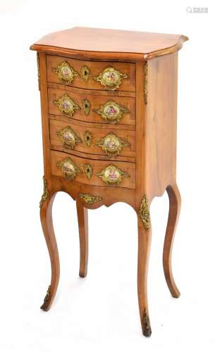 Attractive Continental small walnut bedside commode chest, the serpentine crossbanded top over