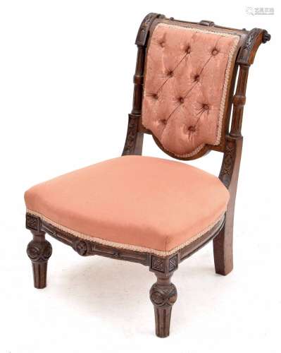 Victorian oak nursing chair, the carved pillared frame and button damask upholstered back over
