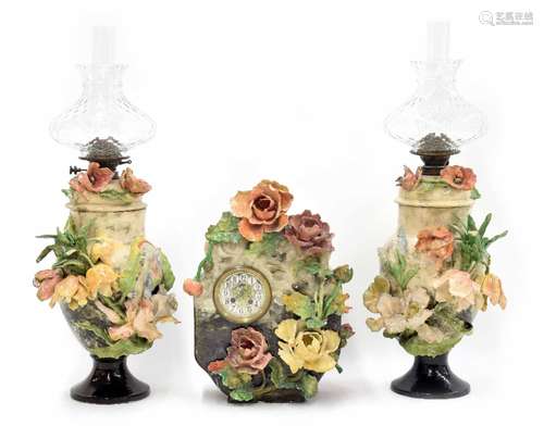 Late 19th century French Barbotine Majolica mantel clock garniture, modelled with flowers, the