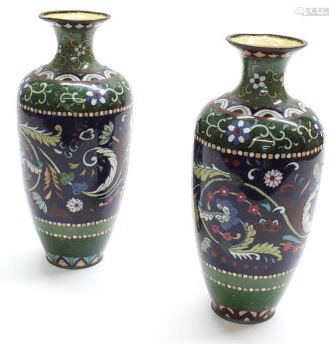 Pair of Japanese cloisonne baluster vases, decorated with bands of foliate motif within multiple