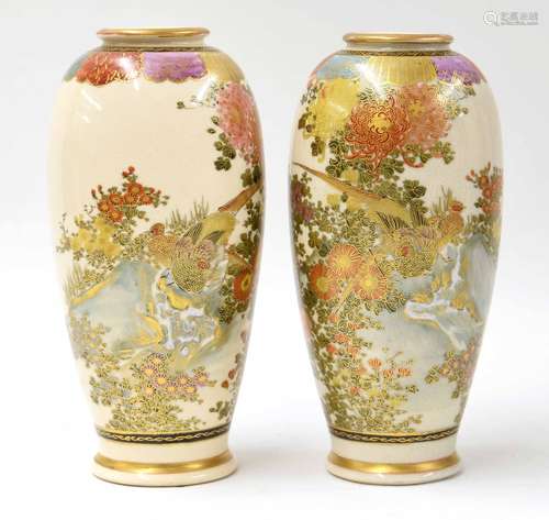 Pair of Japanese Satsuma baluster vases, decorated with birds among branches and flowers, signed,