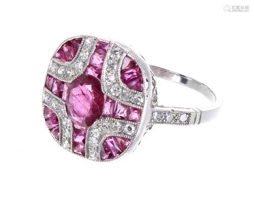 Attractive platinum ruby and diamond dress ring in the Victorian style, set with central oval shaped