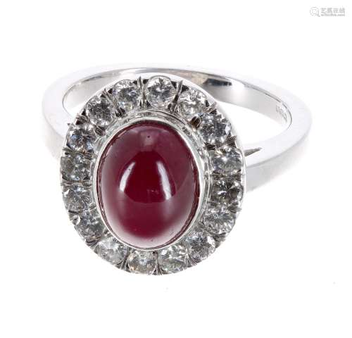 Good 18ct white gold diamond and ruby cabouchon oval cluster ring, the ruby 3.90ct approx, in a
