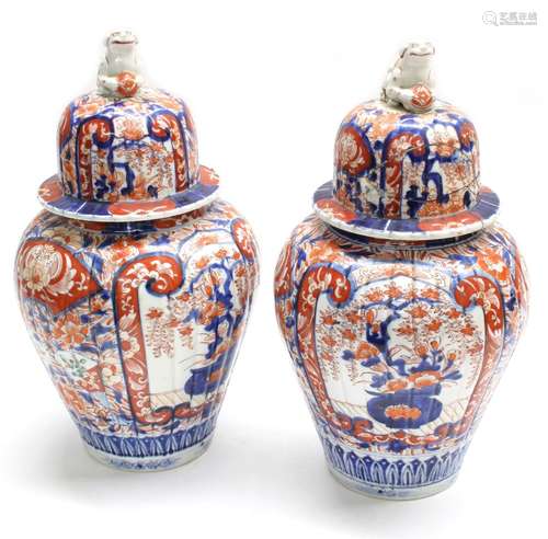 Pair of 19th century Japanese Imari porcelain jars and covers, 15