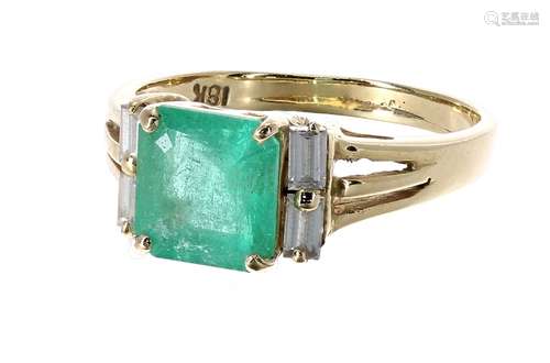 18ct emerald and diamond ring, the emerald 1.73ct approx, the shoulders set with four baguette-cut