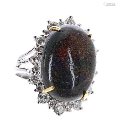 18ct white gold unusual cabouchon black opal and diamond ring, the opal 13.16ct, in a surround of