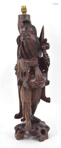 Chinese carved hardwood figural lamp base, 25