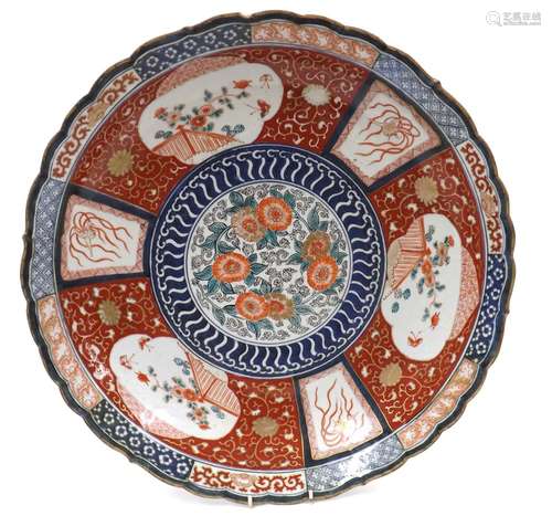 Good large Imari porcelain charger, decorated centrally with floral ring within panelled border