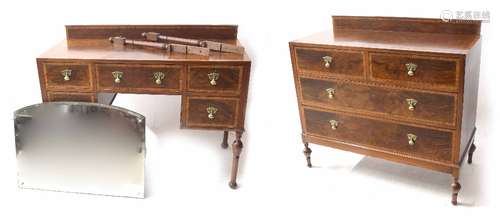 Walnut two piece bedroom suite comprising a chest of drawers and dressing tablle, both with raised