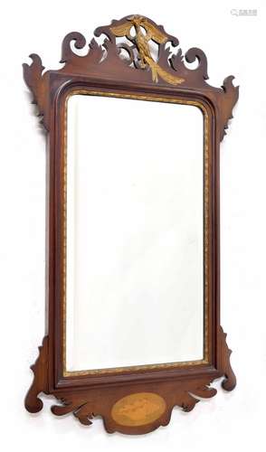 Georgian fretwork wall mirror, the bevelled glass within mahogany frame surmounted by parcel gilt