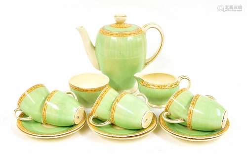 Grindley demi tasse coffee set for six, on a pastel green ground with foliate painted borders