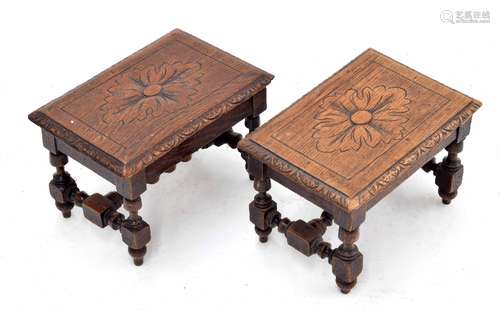 Pair of carved oak foot stools with foliate tops upon short turned supports united by stretchers