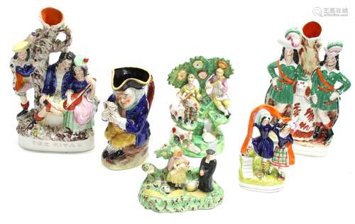 Five Staffordshire flatback figural groups and scenes, tallest 'The Rival' measures 12.5