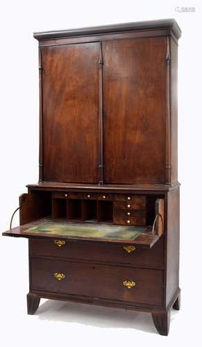 19th century mahogany secretáire bookcase, the moulded cornice over two long cupboard doors