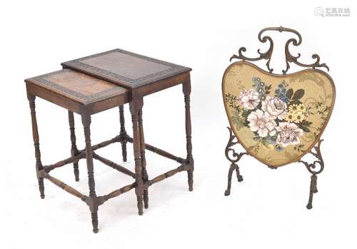 Nest of two mahogany occasional tables, each moulded top with blind fret carved border, raised on