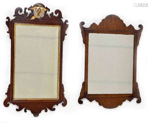 Georgian walnut fretwork wall mirror, inset with a rectangular bevelled plate within a gilt slip and