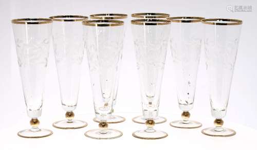 Set of eight cherry etched sundae glasses, each with knopped stem and gilt rim borders, 8.75