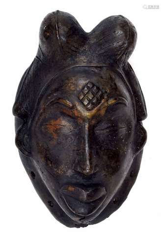 Early 20th century bronze Gabon tribal mask, modelled with lobed coiffure, typical geometric