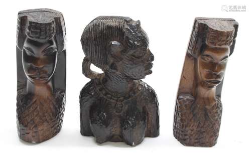 Pair of West African carved hardwood flatback busts, 5.5