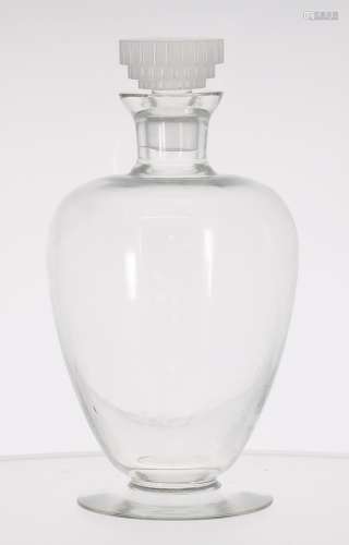René Lalique glass decanter and stopper, of inverted baluster form upon a wide circular base, the