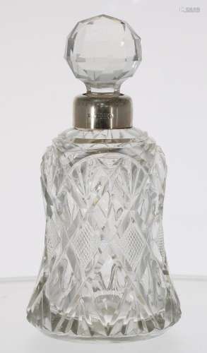 Late 19th century cut glass bell decanter and stopper, with hallmarked silver collar Birmingham