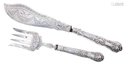 Pair of Victorian silver fish servers, with scrolling engraved decoration and silver King's