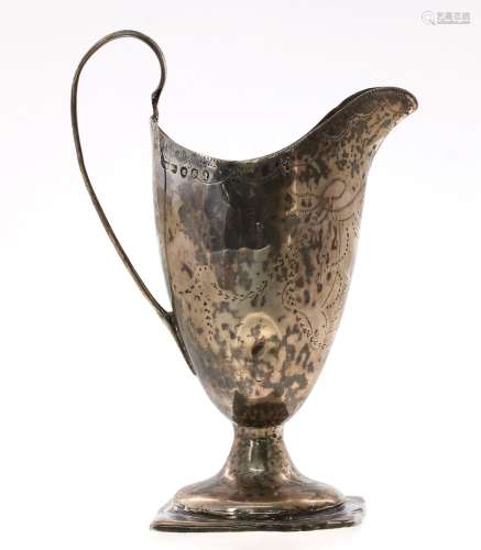 William IV silver pedestal cream jug, with pricked engraved decoration around a monogrammed