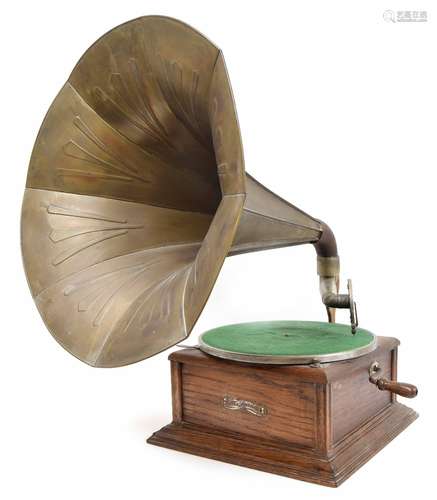 'The Leader' manual wind gramophone, in a square stepped oak case, 14