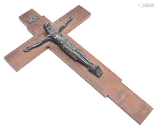 Patinated spelter crucifix mounted to a wooden cross, under 'INRI' plaque, 14