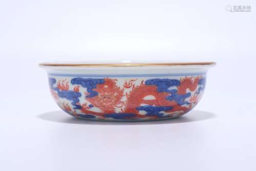 a red glazed porcelain bowl with inward foot,qing dynasty