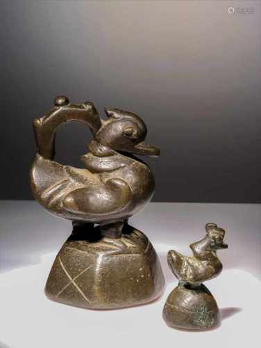 TWO OPIUM WEIGHTS IN BIRD SHAPE