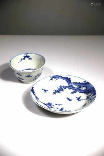 A BLUE AND WHITE CUP SAUCER