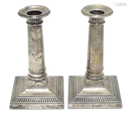 A pair of silver candlesticks hallmarked Sheffield 1917 maker Thomas Bradbury & Sons Ltd. 5