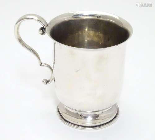 A silver christening mug hallmarked Chester with scroll handle Chester 1923 maker AW. 3