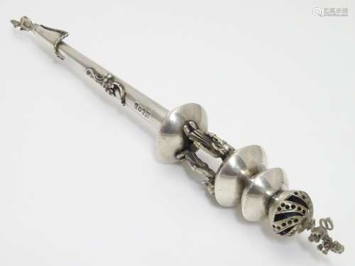 Judaica silver - A 19thC Russian silver yad / Torah pointer, surmounted with a lion and with three