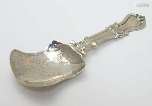 A Victorian silver shovel formed caddy spoon. Hallmarked Birmingham 1868 maker George Unite Approx 3