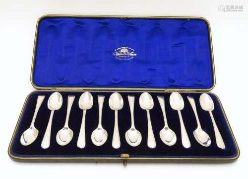 A cased set of 12 silver teaspoons hallmarked London 1901 maker Goldsmiths & Silversmiths Co. Ltd. 4