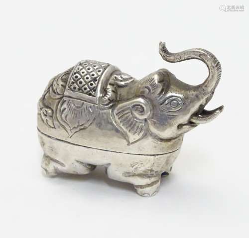 A white metal pill box formed as an elephant. Probably Indian 1 3/4