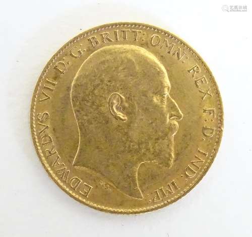 Coin : A 1910 Edward VII gold half sovereign. (4g) Please Note - we do not make reference to the