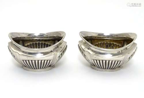 A pair of silver salts hallmarked Birmingham 1938 maker John Rose. 2 3/4