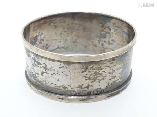 A silver napkin ring hallmarked Birmingham 1936 maker Henry Griffith & Sons Ltd Please Note - we