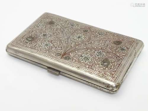 A white metal cigarette case, the eastern/ Islamic style decoration having red and green enamel