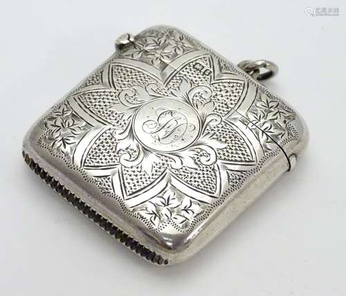 A silver vesta case with engraved decoration hallmarked Chester 1905 maker J & R Griffin (Joseph &