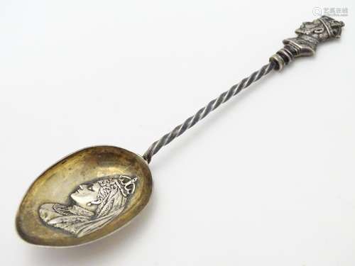 A silver commemorative spoon, having barley twist stem surmounted by bust of King George V, the bowl