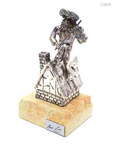 A 925 silver model of a fiddler on a roof mounted on a marble base. Base bears a plaque entitled ?