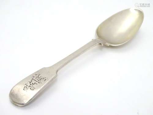 A 19thC Indian silver fiddle pattern dessert spoon by Hamilton & co. 7