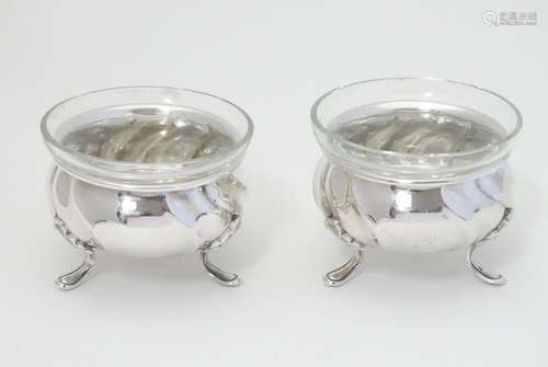 A pair of 20thC Danish silver plate salts with glass liners by Cohr of Denmark. Please Note - we