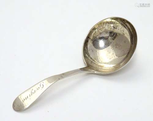 A 19thC Irish silver short ladle hallmarked Dublin maker JW 4