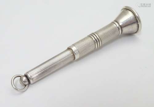 A silver cigar spike with engine turned decoration. Hallmarked Birmingham 1962 maker Cohen &